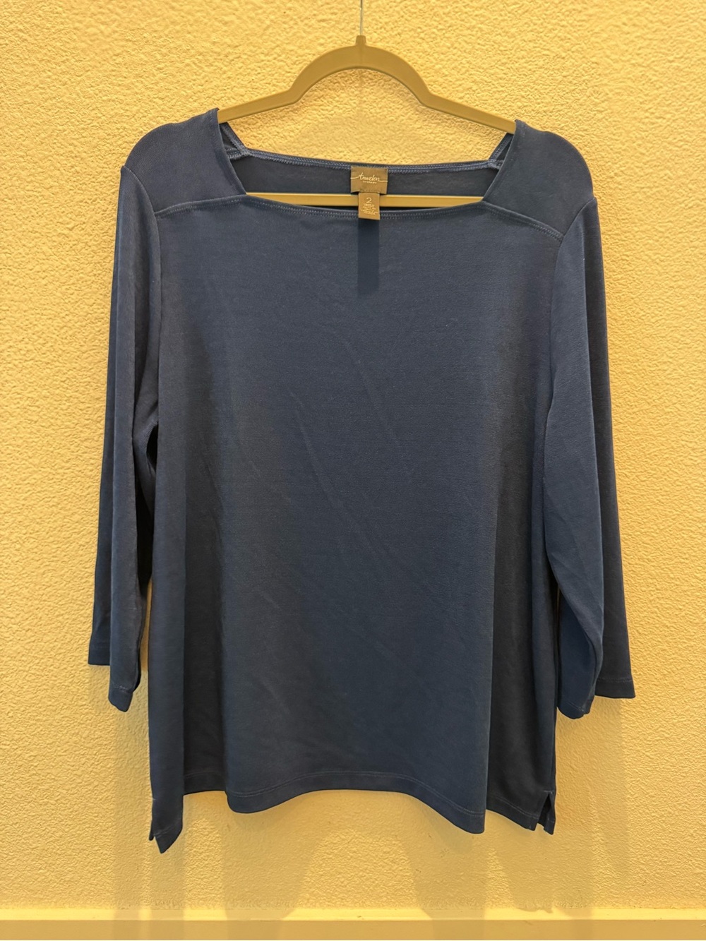 Chicos Travelers dark blue long-sleeve top with a boatneck